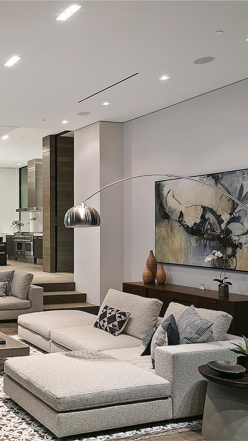 Contemporary living room with large sectional and decor